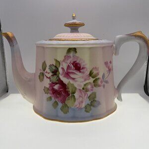 Vintage teapot with pink Roses